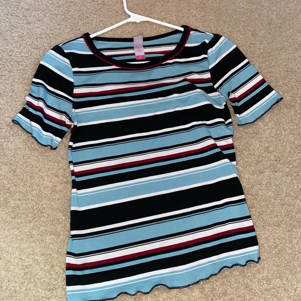 This is made in Hecho in China it is 65% polyester, 30% rayon 5% spandex